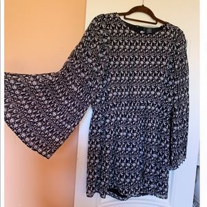 Romper with umbrella sleeves